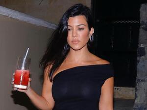 Kourtney Kardashian Is Seen in a Sheer Top Over a Nude Bra
