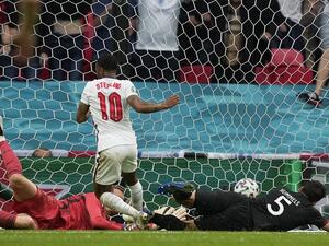 England's forward Raheem Sterling scores England's opening goal during the UEFA EURO 2020 round of 16 football match between England and Germany at Wembley Stadium in London on June 29, 2021. (Photo: AFP)