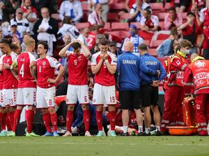 The midfielder collapsed on the field and his former teams Ajax and Tottenham were among many offering their well wishes (Photo: AFP)