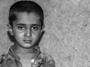 child with sad face expression is crying 