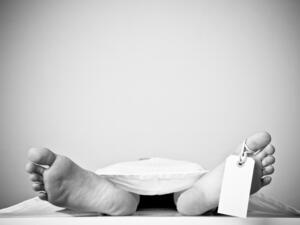 Two feet of a dead body