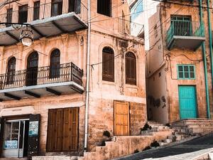 Salt is a hillside town near Amman, Jordan. Its significance as an Ottoman Empire trading hub is reflected in its Ottoman architecture. The early-20th-century Abu Jaber mansion, now the Historic Old Salt Museum, has Italian frescoed ceilings. An Ottoman mosque overlooks Hammam Street with its food market.