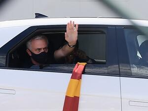 Portuguese football coach Jose Mourinho waves from a car upon his arrival at Rome's Ciampino airport on July 2, 2021. (Photo: AFP)