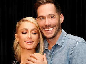 Hilton is engaged to 40-year-old Chris Reum. Hilton is engaged to 40-year-old Chris Reum.
