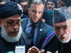 لقاء طالبان بكرزاي