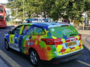 Police car decorated with pride flag to decrease hate crimes