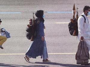 RT slammad for Phototoshop image of Afghani family 