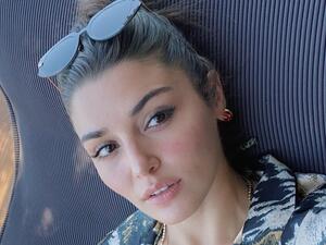 Hande Erçel Parades Her Fit Figure in Green Bikini While Vacationing in Türkbükü (Pictures)