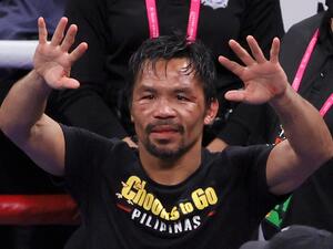 Manny Pacquiao gestures to fans after his WBA welterweight title fight against Yordenis Ugas at T-Mobile Arena on August 21, 2021 in Las Vegas, Nevada. Ugas retained his title by unanimous decision. (Photo: AFP)