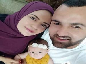 Anhar Al Deek With her husband and 1-year-old daughter