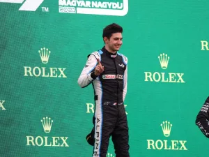 (LtoR) Second placed Aston Martin's German driver Sebastian Vettel, winner Alpine's French driver Esteban Ocon and third placed Mercedes' British driver Lewis Hamilton celebrate on the podium after the Formula One Hungarian Grand Prix at the Hungaroring race track in Mogyorod near Budapest on August 1, 2021. (Photo: AFP)