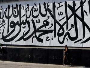 an Afghan journalist was attacked by the Taliban for interviewing a woman