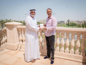 Ismail Sharif, Managing Director of Jumeirah Golf Estates presents Jeev Milkha Singh with his Golden Visa (Photo: Supplied)