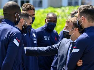 French President Emmanuel Macron (2nd-R) speaks with France's forward Karim Benzema (2nd-L) before a lunch in Clairefontaine-en-Yvelines on June 10, 2021 ahead of the UEFA EURO 2020 football competition. (Photo: AFP)