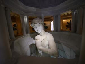 A giant replica of a Roman statue is pictured inside the Italian pavilion at the Expo 2020, in the Gulf Emirate of Dubai, on October 1, 2021. 