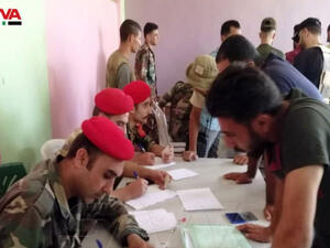 تسوية أوضاع المسلحين في درعا