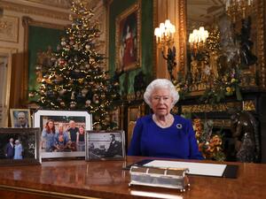 Windsor Castle's Garter Tower is illuminated with images of the stained glass architecture and motifs from St George's Chapel dating back to the 15th century
