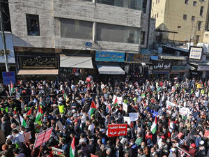 Mass demonstrators in Amman
