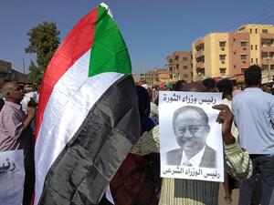ousted prime minister is currently on his way to the royal palace to meet Al-Burhan