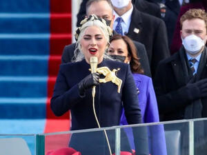 Her hair was styled into crown-like braids  Her hair was styled into crown-like braids
