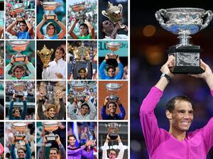 This combination of pictures created early on January 31, 2022 shows Spain's Rafael Nadal posing with the trophies of his 21 Grand Slam victories (from top L to bottom R) on June 5, 2005 during Roland Garros; on June 11, 2006 during Roland Garros; on June 10, 2007 during Roland Garros; on June 8, 2008 during Roland Garros; on July 6, 2008 during Wimbledon; on February 2, 2009 during the Australian Open; on June 6, 2010 during Roland Garros; on July 4, 2010 during Wimbledon; on September 13, 2010 during the US Open; on June 5, 2011 during Roland Garros; on June 11, 2012 during Roland Garros; on June 9, 2013 during Roland Garros; on September 9, 2013 during the US Open; on June 8, 2014 during Roland Garros; on June 11, 2017 during Roland Garros; on September 10, 2017 during the US Open; on June 10, 2018 during Roland Garros; on June 9, 2019 during Roland Garros; on September 8, 2019 during the US Open; on October 11, 2020 wearing a facemask during Roland Garros; and early on January 31, 2022 after winning the A Rafael Nadal roared back from two sets down to win a titanic five-set duel with Daniil Medvedev and make history with "a special" 21st Grand Slam men's title in the Australian Open final on Sunday.