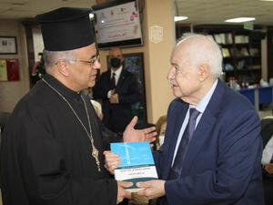Fr. Shahateet Presents his Book: ‘Christians and the Citizenship in the Arab Countries: Rights and Duties’ to Dr. Talal Abu Ghazaleh