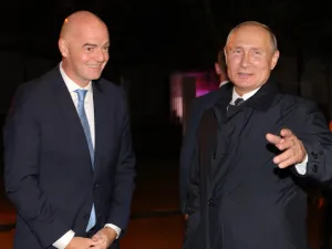 Russia's President Vladimir Putin (R) welcomes FIFA President Gianni Infantino upon his arrival to the far-eastern Russian port of Vladivostok on September 4, 2019, ahead of the start of the Eastern Economic Forum hosted by Russia. / AFP / SPUTNIK / Mikhail Klimentyev