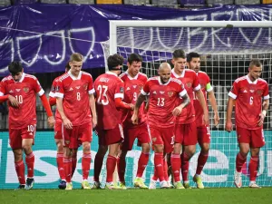 Russia’s players celebrate after scoring a goal during the FIFA World Cup Qatar 2022 qualification Group H football match between Slovenia and Russia at the Ljudski vrt Stadium in Maribor on October 11, 2021. (Photo by Jure Makovec / AFP)