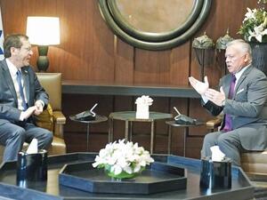 King Abdullah (R) meets with Israeli President Isaac Herzog 