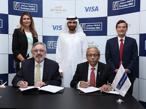 بنك الإمارات دبي الوطني وبرنامج "ضيف الاتحاد" يتعاونان لإطلاق بطاقات ائتمانية جديدة بعلامات تجارية مشتركة