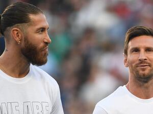 Paris Saint-Germain's Spanish defender Sergio Ramos (L) and Paris Saint-Germain's Argentinian forward Lionel Messi pose during a presentation ceremony prior to the French L1 football match between Paris Saint-Germain and Racing Club Strasbourg at the Parc des Princes stadium in Paris on August 14, 2021. (Photo by Bertrand GUAY / AFP) Paris Saint-Germain's Spanish defender Sergio Ramos (L) and Paris Saint-Germain's Argentinian forward Lionel Messi pose during a presentation ceremony prior to the French L1 football match between Paris Saint-Germain and Racing Club Strasbourg at the Parc des Princes stadium in Paris on August 14, 2021. (Photo by Bertrand GUAY / AFP)
