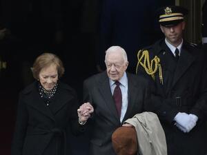 Jimmy Carter (L) and his wife Rosalynn 