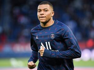 Paris Saint-Germain's French forward Kylian Mbappe looks on ahead of the French L1 football match between Paris-Saint Germain (PSG) and Lens (RCL) at The Parc des Princes Stadium in Paris on April 23, 2022. (Photo by bERTRAND GUAY / AFP)