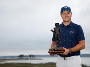 Jordan Spieth poses with the trophy after winning the RBC Heritage in a playoff at Harbor Town Golf Links on April 17, 2022 in Hilton Head Island, South Carolina. Jared C. Tilton/Getty Images/AFP (Photo by Jared C. Tilton / GETTY IMAGES NORTH AMERICA / Getty Images via AFP)