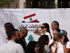 Lebanese expats queue to cast their votes for the May 15 parliamentary elections