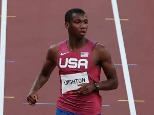 USA's Erriyon Knighton competes in the men's 200m semi-finals during the Tokyo 2020 Olympic Games at the Olympic Stadium in Tokyo on August 3, 2021. (Photo by Giuseppe CACACE / AFP)