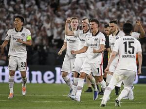 Frankfurt players celebrate after winning the UEFA Europa League final football match between Eintracht Frankfurt and Glasgow Rangers at the Ramon Sanchez Pizjuan stadium in Seville on May 18, 2022. (Photo by JORGE GUERRERO / AFP) Frankfurt players celebrate after winning the UEFA Europa League final football match between Eintracht Frankfurt and Glasgow Rangers at the Ramon Sanchez Pizjuan stadium in Seville on May 18, 2022. (Photo by JORGE GUERRERO / AFP)