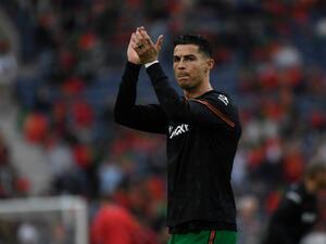 Portugal's forward Cristiano Ronaldo gestures before the start of the World Cup 2022 qualifying final first leg football match between Portugal and North Macedonia at the Dragao stadium in Porto on March 29, 2022. (Photo by MIGUEL RIOPA / AFP) Portugal's forward Cristiano Ronaldo gestures before the start of the World Cup 2022 qualifying final first leg football match between Portugal and North Macedonia at the Dragao stadium in Porto on March 29, 2022. (Photo by MIGUEL RIOPA / AFP)