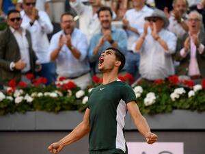 Spain's Carlos Alcaraz celebrates after winning the 2022 ATP Tour Madrid Open tennis tournament men's singles final match against Germany's Alexander Zverev at the Caja Magica in Madrid on May 8, 2022. (Photo by OSCAR DEL POZO / AFP) Spain's Carlos Alcaraz celebrates after winning the 2022 ATP Tour Madrid Open tennis tournament men's singles final match against Germany's Alexander Zverev at the Caja Magica in Madrid on May 8, 2022. (Photo by OSCAR DEL POZO / AFP)