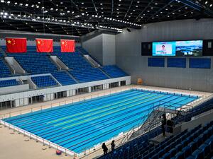 This picture taken on October 19, 2021, shows the Hangzhou Olympic and International Expo Center in the city of Hangzhou, in Zhejiang province. The 2022 Asian Games in China is facing the "possibility" of being postponed, a senior official told AFP on April 21, 2022, after a rumour that it would be moved to next year. (Photo by Hector RETAMAL / AFP)