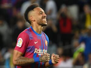 Barcelona's Gabonese midfielder Pierre-Emerick Aubameyang celebrates after scoring a goal during the Spanish league football match between FC Barcelona and RC Celta de Vigo at the Camp Nou stadium in Barcelona on May 10, 2022. (Photo by LLUIS GENE / AFP) Barcelona's Gabonese midfielder Pierre-Emerick Aubameyang celebrates after scoring a goal during the Spanish league football match between FC Barcelona and RC Celta de Vigo at the Camp Nou stadium in Barcelona on May 10, 2022. (Photo by LLUIS GENE / AFP)