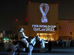 ile photo taken on September 3, 2019, a mounted policeman rides past a building on which the official logo of the FIFA World Cup Qatar 2022 logo is projected at the Qatari capital Doha's traditional Souq Waqif market. Migrant labourers are working through the night near the World Cup clock that will start counting down 200 days to kick-off on May 5, 2022, with hosts Qatar facing mounting questions over costs and conditions for fans. (Photo by AFP) ile photo taken on September 3, 2019, a mounted policeman rides past a building on which the official logo of the FIFA World Cup Qatar 2022 logo is projected at the Qatari capital Doha's traditional Souq Waqif market. Migrant labourers are working through the night near the World Cup clock that will start counting down 200 days to kick-off on May 5, 2022, with hosts Qatar facing mounting questions over costs and conditions for fans. (Photo by AFP)