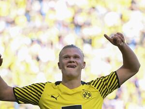 Dortmund's Norwegian forward Erling Braut Haaland celebrates scoring during the German first division Bundesliga football match Borussia Dortmund v VfL Wolfsburg in Dortmund, western Germany. Manchester City said Tuesday, May 10, they had reached an agreement in principle with Borussia Dortmund to sign striker Erling Haaland. (Photo by INA FASSBENDER / AFP) Dortmund's Norwegian forward Erling Braut Haaland celebrates scoring during the German first division Bundesliga football match Borussia Dortmund v VfL Wolfsburg in Dortmund, western Germany. Manchester City said Tuesday, May 10, they had reached an agreement in principle with Borussia Dortmund to sign striker Erling Haaland. (Photo by INA FASSBENDER / AFP)
