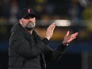 Liverpool's German manager Jurgen Klopp waves to supporters at the end of the UEFA Champions League semi final second leg football match between Liverpool and Villarreal CF at La Ceramica stadium in Vila-real on May 3, 2022. (Photo by Paul ELLIS / AFP) Liverpool's German manager Jurgen Klopp waves to supporters at the end of the UEFA Champions League semi final second leg football match between Liverpool and Villarreal CF at La Ceramica stadium in Vila-real on May 3, 2022. (Photo by Paul ELLIS / AFP)