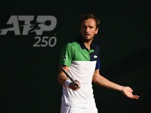 Russia's Daniil Medvedev reacts after losing a point against France's Richard Gasquet during their ATP 250 Geneva Open tennis match in Geneva on May 17, 2022. (Photo by Fabrice COFFRINI / AFP)