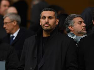 Manchester City Emirati chairman Khaldoon al-Mubarak waits in the stands ahead of the UEFA Champions League second leg quarter-final football match between Manchester City and Liverpool, at the Etihad Stadium in Manchester, north west England on April 10, 2018. (Photo by Anthony Devlin / AFP)