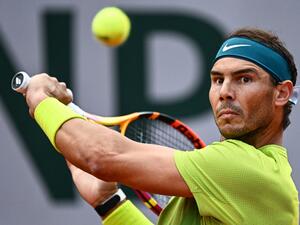Spain's Rafael Nadal returns the ball to Netherland's Botic Van De Zandschulp during their men's singles match on day six of the Roland-Garros Open tennis tournament at the Court Suzanne-Lenglen in Paris on May 27, 2022. (Photo by Anne-Christine POUJOULAT / AFP) Spain's Rafael Nadal returns the ball to Netherland's Botic Van De Zandschulp during their men's singles match on day six of the Roland-Garros Open tennis tournament at the Court Suzanne-Lenglen in Paris on May 27, 2022. (Photo by Anne-Christine POUJOULAT / AFP)