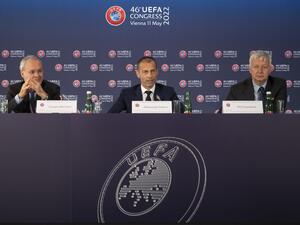 Deputy General Secretary of UEFA, Giorgio Marchetti (left), UEFA president Aleksander Ceferin and Philip Townsend (right) UEFA's managing director of communications, speak during the final press conference at the end of the 46th UEFA Congress and Executive Committee meeting at the Messe Wien Exhibition Congress Center in Vienna, Austria on May 11, 2022. (Photo by JOE KLAMAR / AFP) Deputy General Secretary of UEFA, Giorgio Marchetti (left), UEFA president Aleksander Ceferin and Philip Townsend (right) UEFA's managing director of communications, speak during the final press conference at the end of the 46th UEFA Congress and Executive Committee meeting at the Messe Wien Exhibition Congress Center in Vienna, Austria on May 11, 2022. (Photo by JOE KLAMAR / AFP)