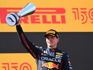 Red Bull's Dutch driver Max Verstappen celebrates on the podium after the Spanish Formula One Grand Prix at the Circuit de Catalunya on May 21, 2022 in Montmelo, on the outskirts of Barcelona. (Photo by GABRIEL BOUYS / AFP) Red Bull's Dutch driver Max Verstappen celebrates on the podium after the Spanish Formula One Grand Prix at the Circuit de Catalunya on May 21, 2022 in Montmelo, on the outskirts of Barcelona. (Photo by GABRIEL BOUYS / AFP)