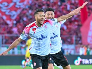 Wydad's forward Zouhair el-Moutaraji (L) celebrates with teammates after scoring during the CAF Champions League Semi-Final between Egypt's al-Ahly and Morocco's Wydad AC at Stade Mohammed V in the Moroccan city of Casablanca on May 30, 2022. (Photo by AFP) Wydad's forward Zouhair el-Moutaraji (L) celebrates with teammates after scoring during the CAF Champions League Semi-Final between Egypt's al-Ahly and Morocco's Wydad AC at Stade Mohammed V in the Moroccan city of Casablanca on May 30, 2022. (Photo by AFP)